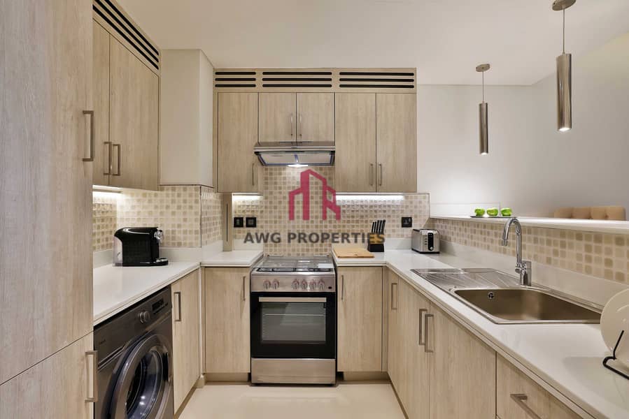 5 NH_Collection_Dubai_The_Palm_Superior_One_Bedroom_Sea_View_Apartment_Kitchen. jpg