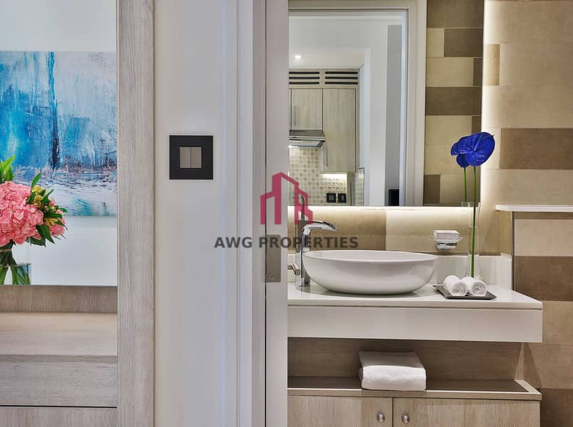 7 NH_Collection_Dubai_The_Palm_Superior_One_Bedroom_Sea_View_Apartment_Guest_Bathroom. jpg