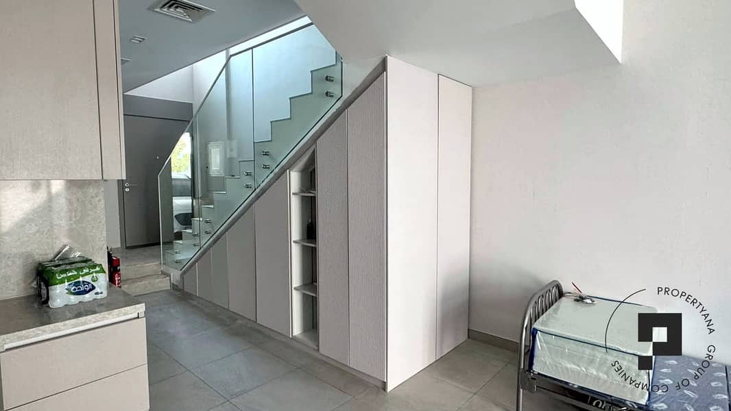 10 14-storage-under-stairs. jpg