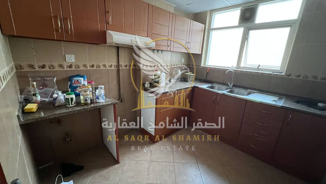 12 apartment-for-rent-1-bedroom-alqlyaa-alsharqa-kitchen-09. jpg