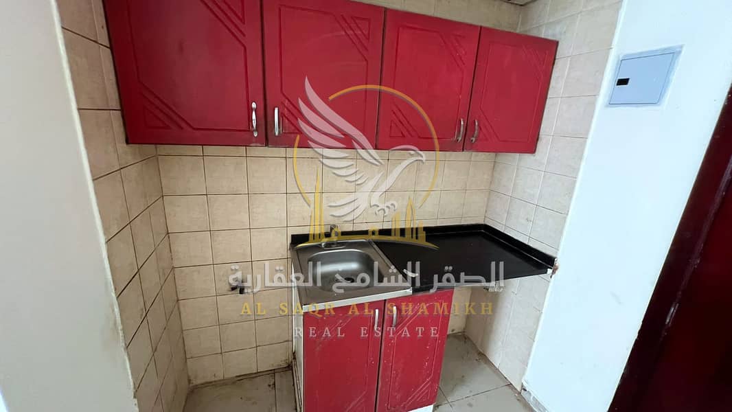 11 shqa-for-rent-1-bedroom-albwtyna-alsharqa-kitchen-10. jpg
