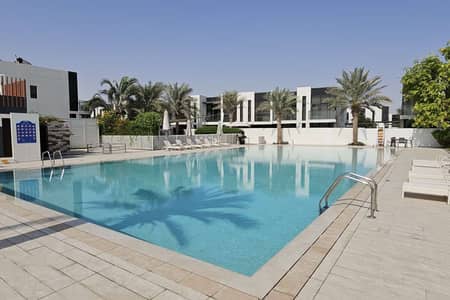 4 habitaciones Villa para en Alquiler en DAMAC Hills 2 (Akoya by DAMAC), Dubai - Community Pool. jpg 4 habitaciones Villa para en Alquiler en DAMAC Hills 2 (Akoya by DAMAC), Dubai - Community Pool. jpg