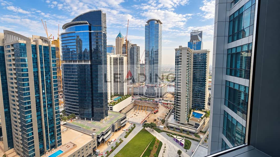 14 Refined skyline through an office window. png