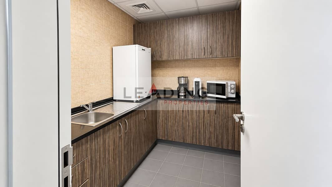 16 Refined compact pantry kitchen. png