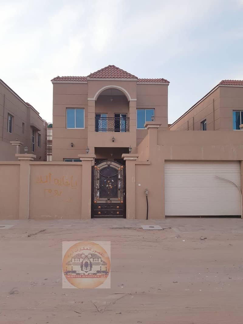Villa for sale in Ajman, Al Mowaihat area, with electricity and water, next to a mosque