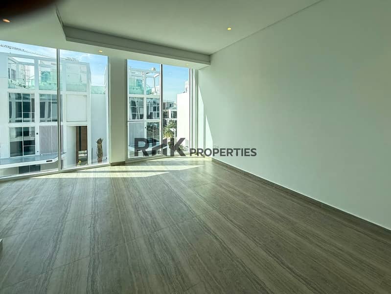 3 Spacious luxury townhouse bedroom with floor-to-ceiling windows, natural light and contemporary interiors