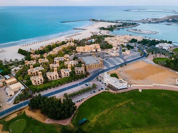 12 aerial-view-al-hamra-golf-600nw-2099694844. webp