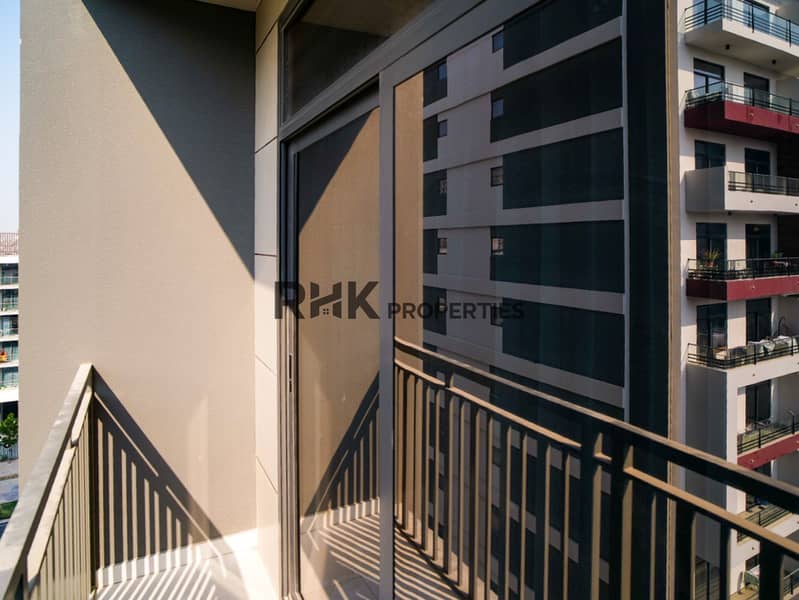 12 Private balcony with sliding glass door in a furnished studio apartment at Floarea Residence Dubai