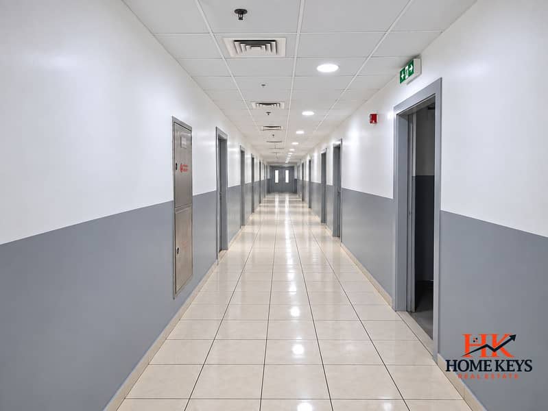 3 Renovated Institutional Corridor Perspective. png