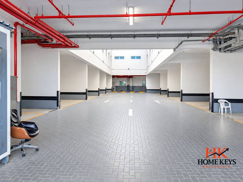 6 Modern Garage Entrance with Red Pipework. png