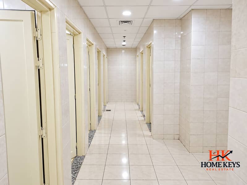 7 Symmetrical Tiled Restroom Corridor. png