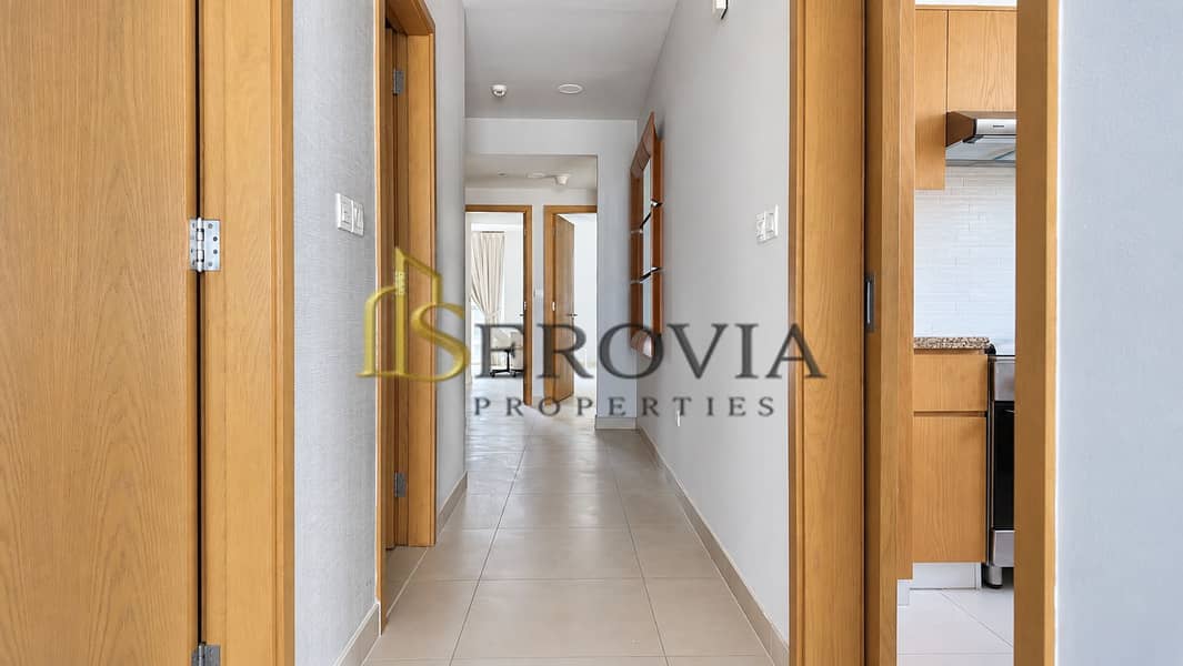 5 Modern Apartment Hallway with Kitchen Glimpse. png