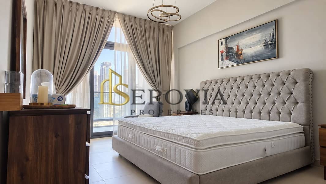 9 Sunlit Tufted Bedroom with City View. png
