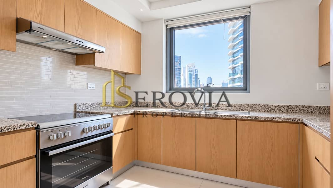 10 Bright Modern Kitchen with City View. png