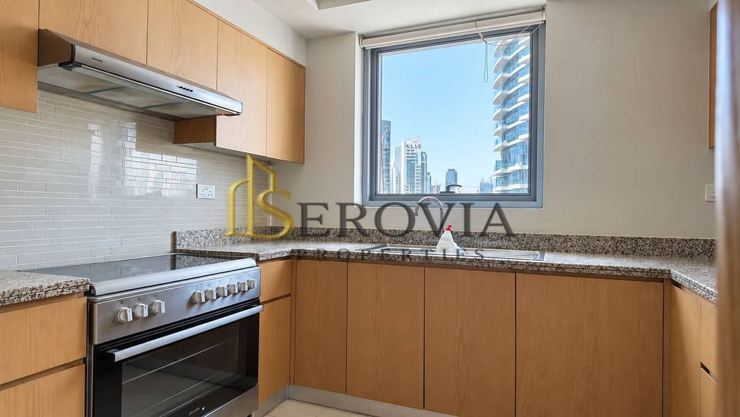 11 Modern Kitchen with City Skyline Views. png