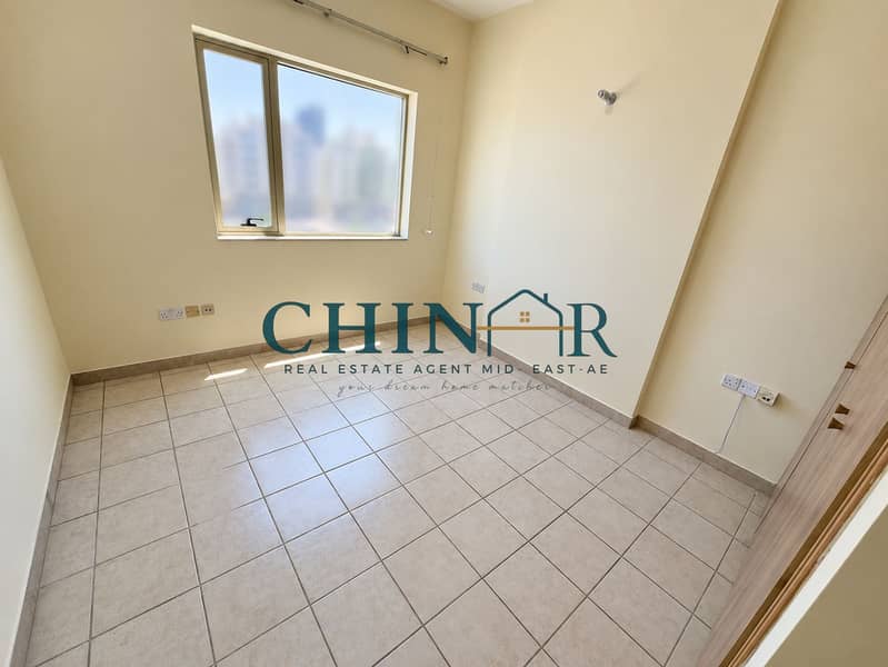 3 Bright Empty Beige-Tiled Room. png