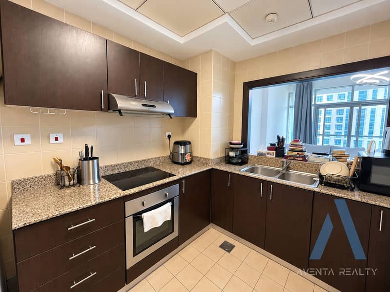4 Warm Modern L-Shaped Kitchen Interior. png
