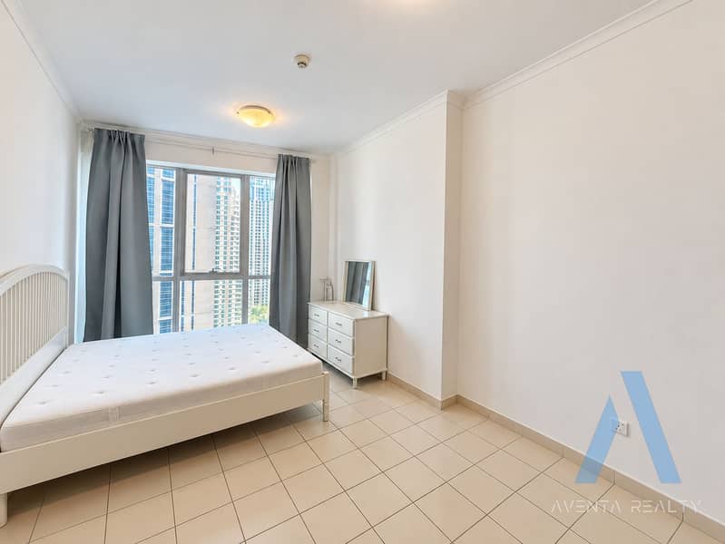 6 Minimalist Bedroom with City View. png