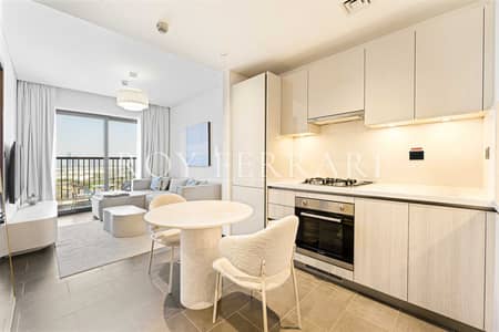 Appartement de 1 chambre à à louer à Sobha Hartland, Dubai - 01_Kitchen_and_dining. jpg