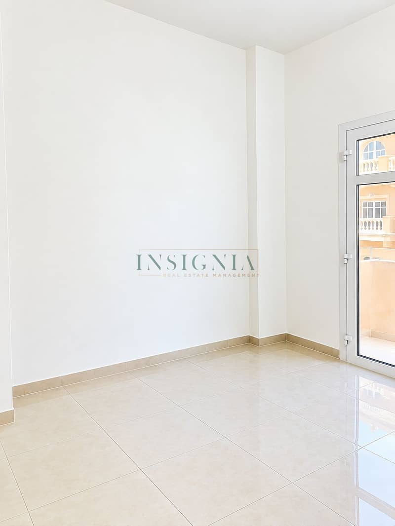 2 Bright Minimalist Room with Glass Door. png