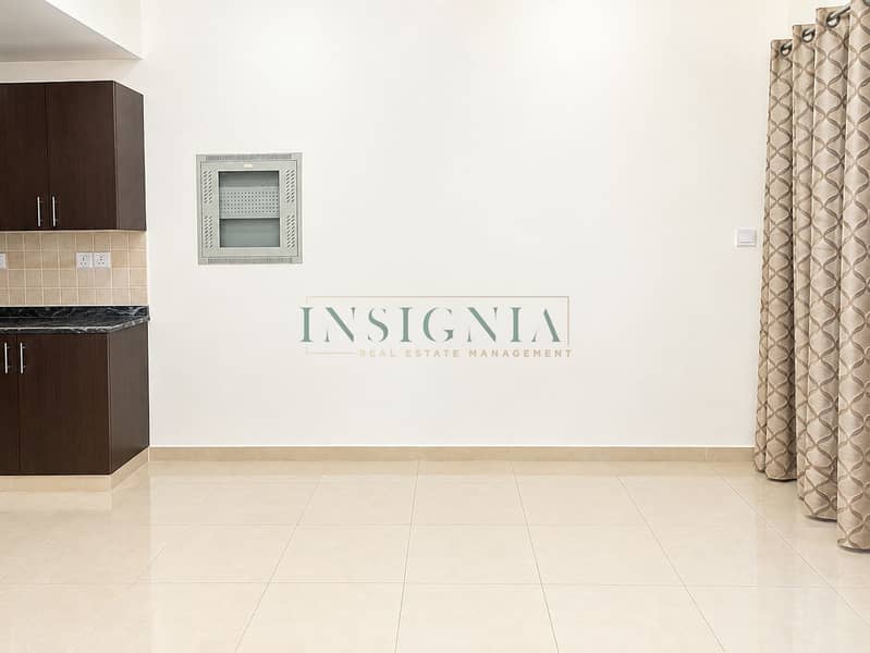 5 Minimalist Apartment Interior with Kitchenette and Curtain. png