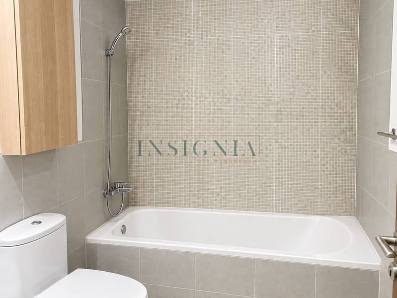 6 Minimalist Gray Tile Bathroom. png