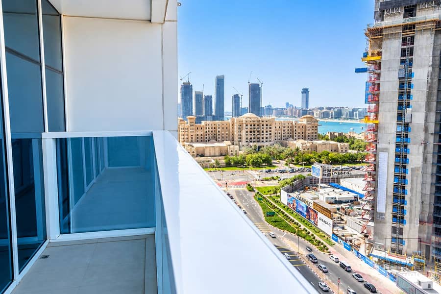4 Sunny Balcony Overlooking Dubai Skyline. png