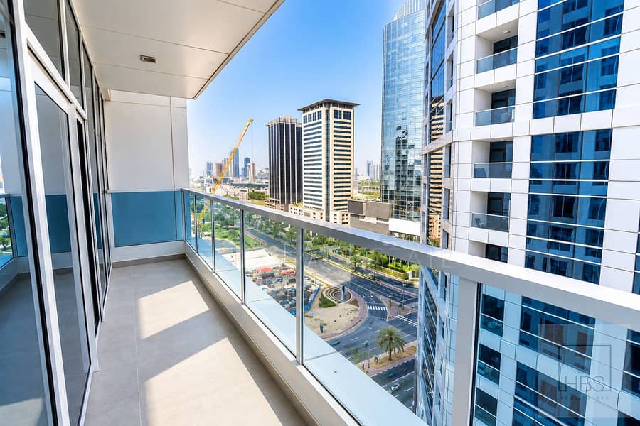 8 Sunlit Balcony Overlooking Modern Cityscape. png