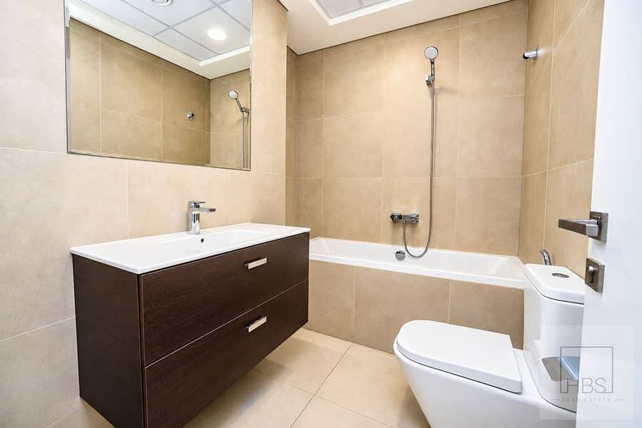16 Modern Beige-Tiled Bathroom (2). png