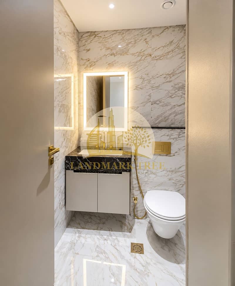 5 Luxury Marble Bathroom with Gold Accents. png