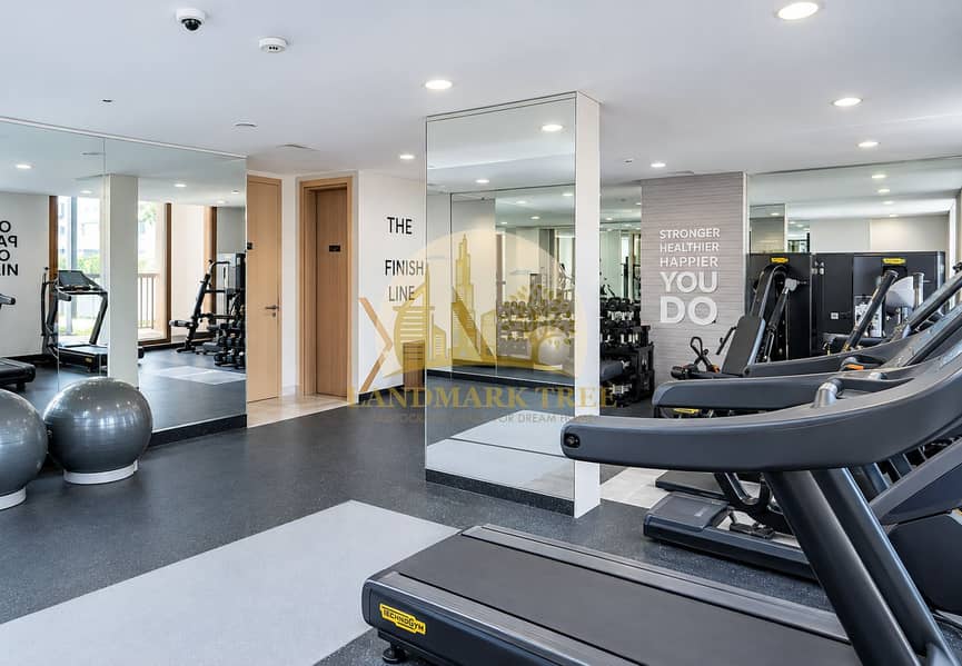 9 Modern Mirror-Lined Technogym Studio. png