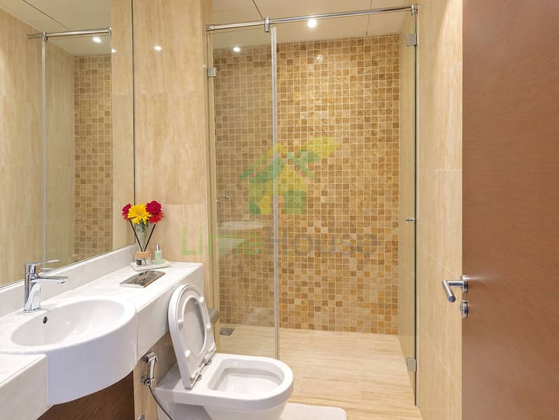 8 dubai-business-bay-ubora-tower-2-bedroom-apartment-bathroom-shower-04. jpg