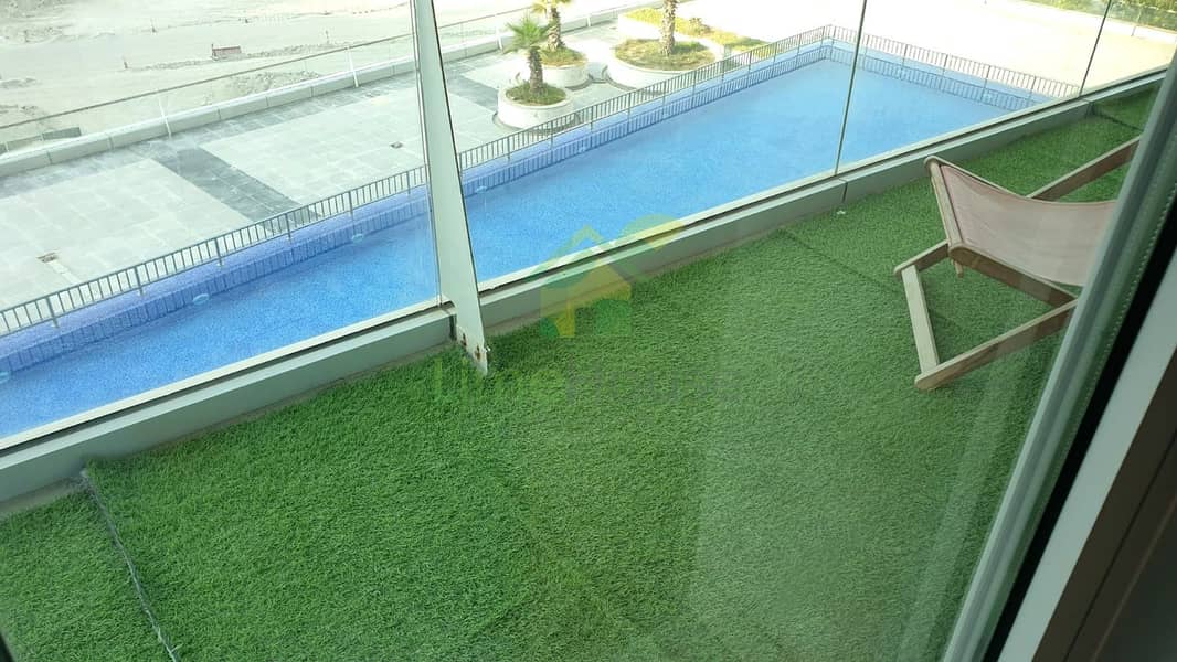 9 dubai-business-bay-ubora-tower-2-bedroom-apartment-balcony-pool-view-08. jpg