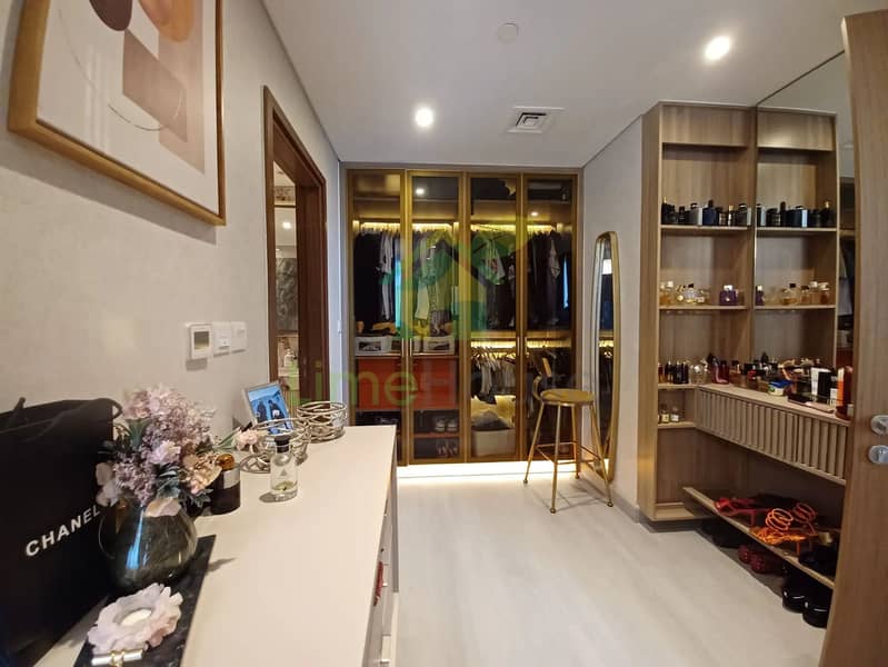 13 3-bedroom-apartment-5242-dubai-marina-walk-in-closet-glass-wardrobes-vanity. webp