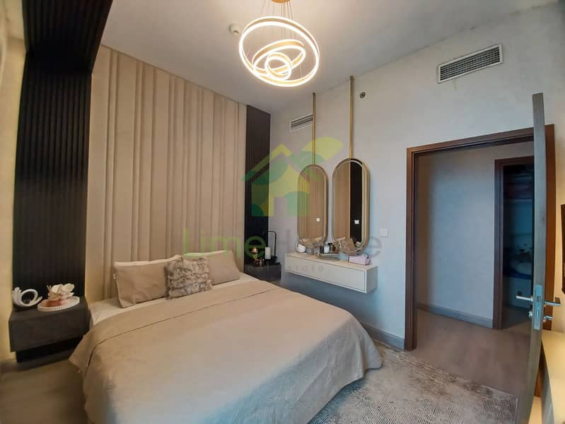 17 3-bedroom-apartment-5242-dubai-marina-bedroom-modern-chandelier-padded-headboard-2. webp