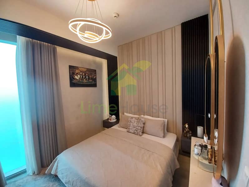 19 3-bedroom-apartment-5242-dubai-marina-bedroom-modern-chandelier-padded-headboard. webp