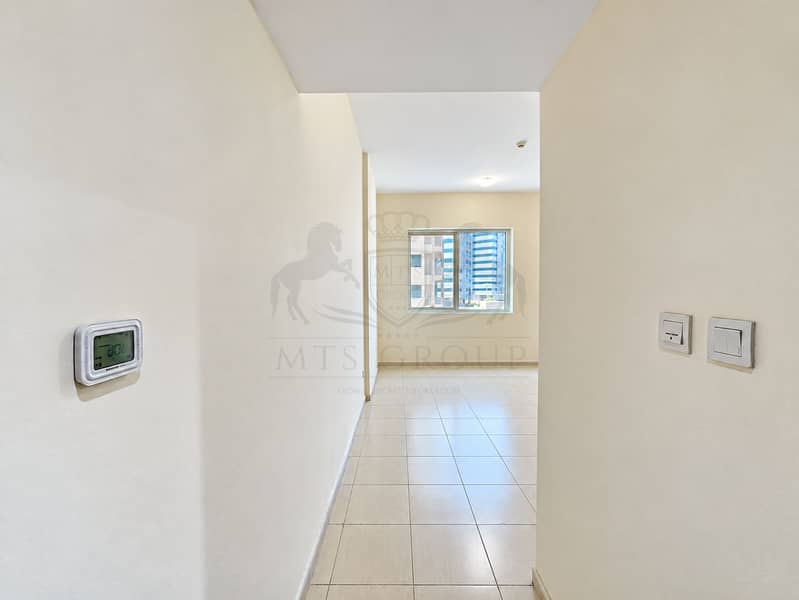 5 Minimal Apartment Hallway with City View. png