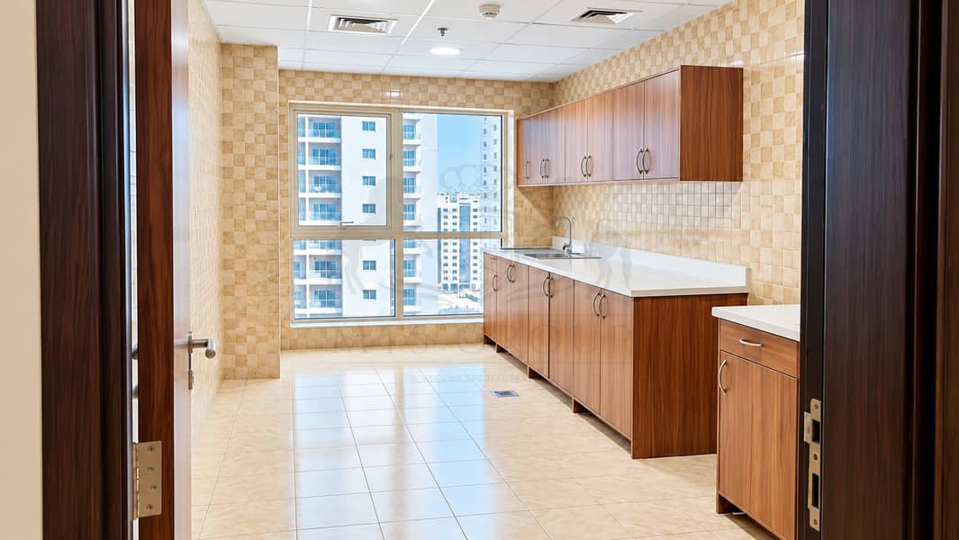 9 Bright Tiled Kitchen with City View. png
