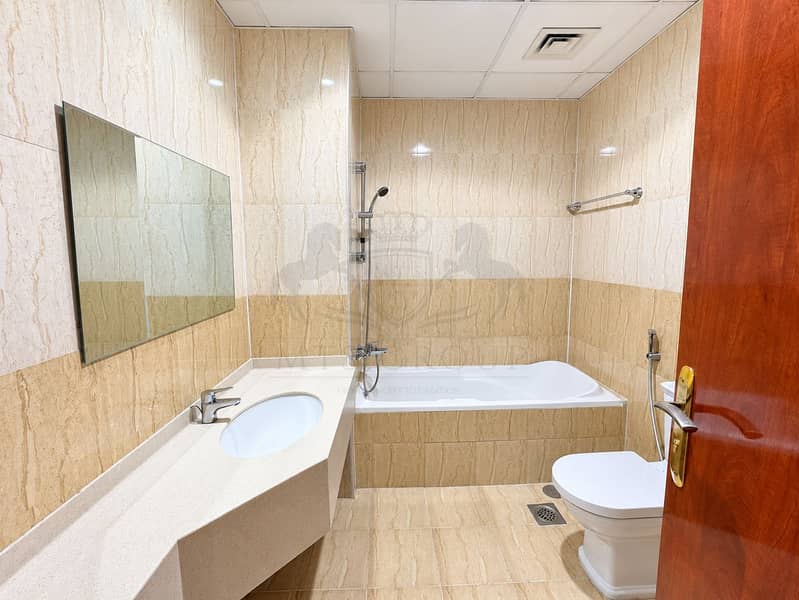 15 Modern Beige Tiled Bathroom Interior. png