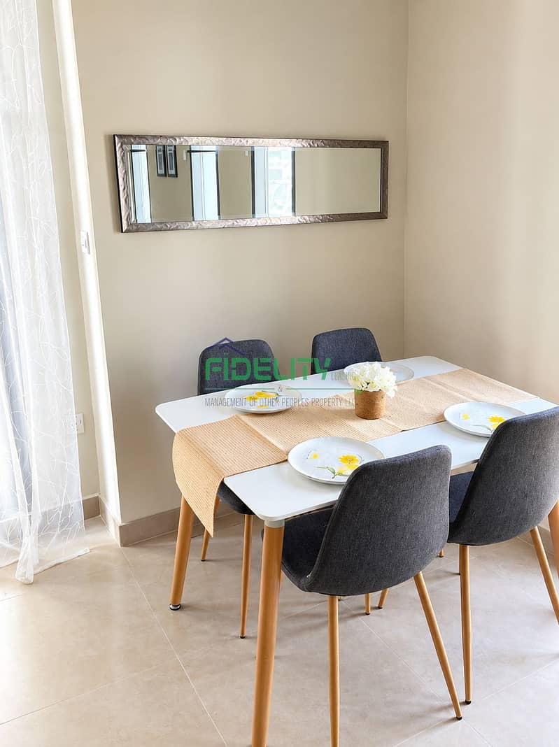 3 Modern Beige Dining Nook with Floral Tableware. png