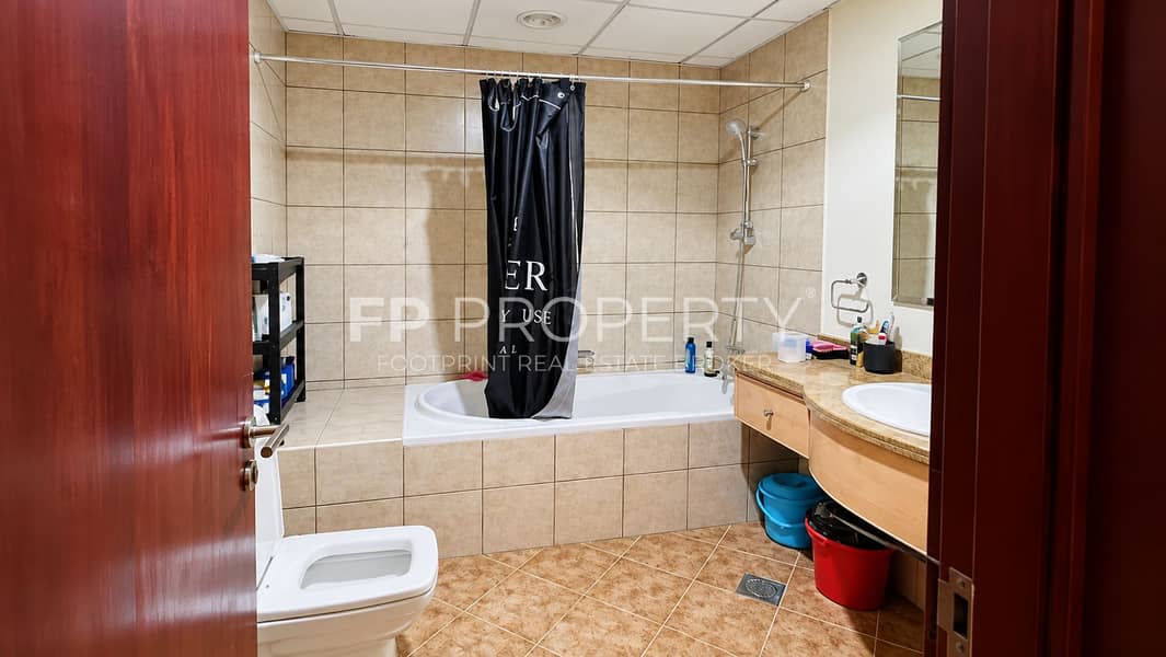 9 Framed Beige Tile Bathroom Interior. png