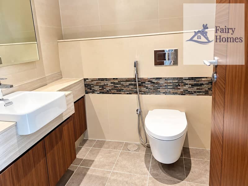 6 Modern Beige Bathroom with Mosaic Accent. png
