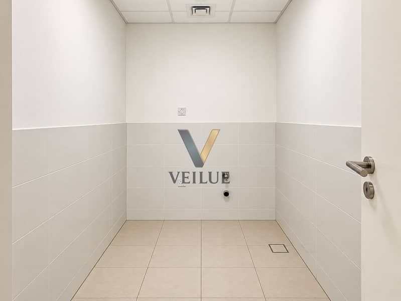 7 Minimalist Tiled Utility Room. png