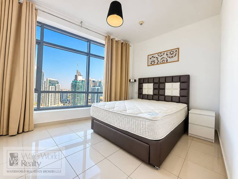 3 Bright Modern Bedroom with Skyline View. png