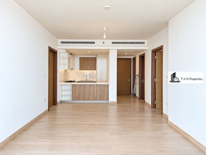 8 Modern Empty Apartment with Open Kitchen. png
