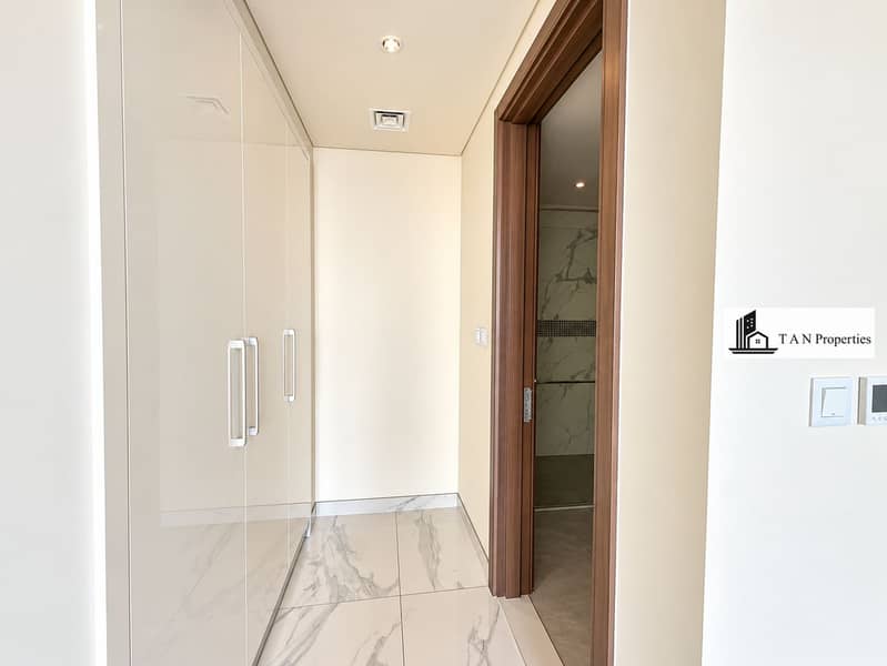 11 Minimalist Marble Hallway and Bathroom Entry. png