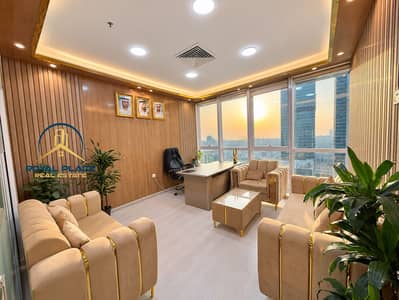 مکتب  للايجار في الخليج التجاري، دبي - Warm sunset executive office lounge. png