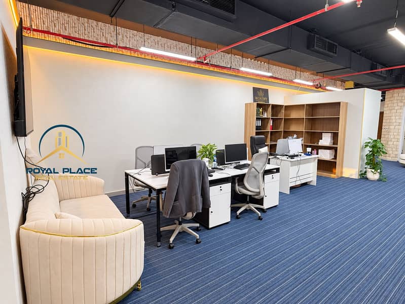 8 Bright furnished office with exposed ceiling. png