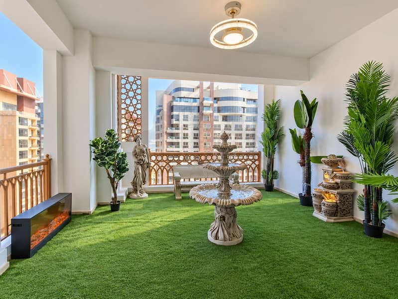 7 Lush Terrace Garden with Fountain and Cityscape. png