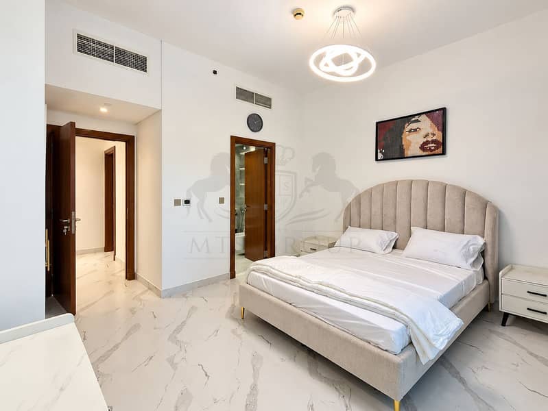 10 Modern Neutral Bedroom with Arched Headboard. png